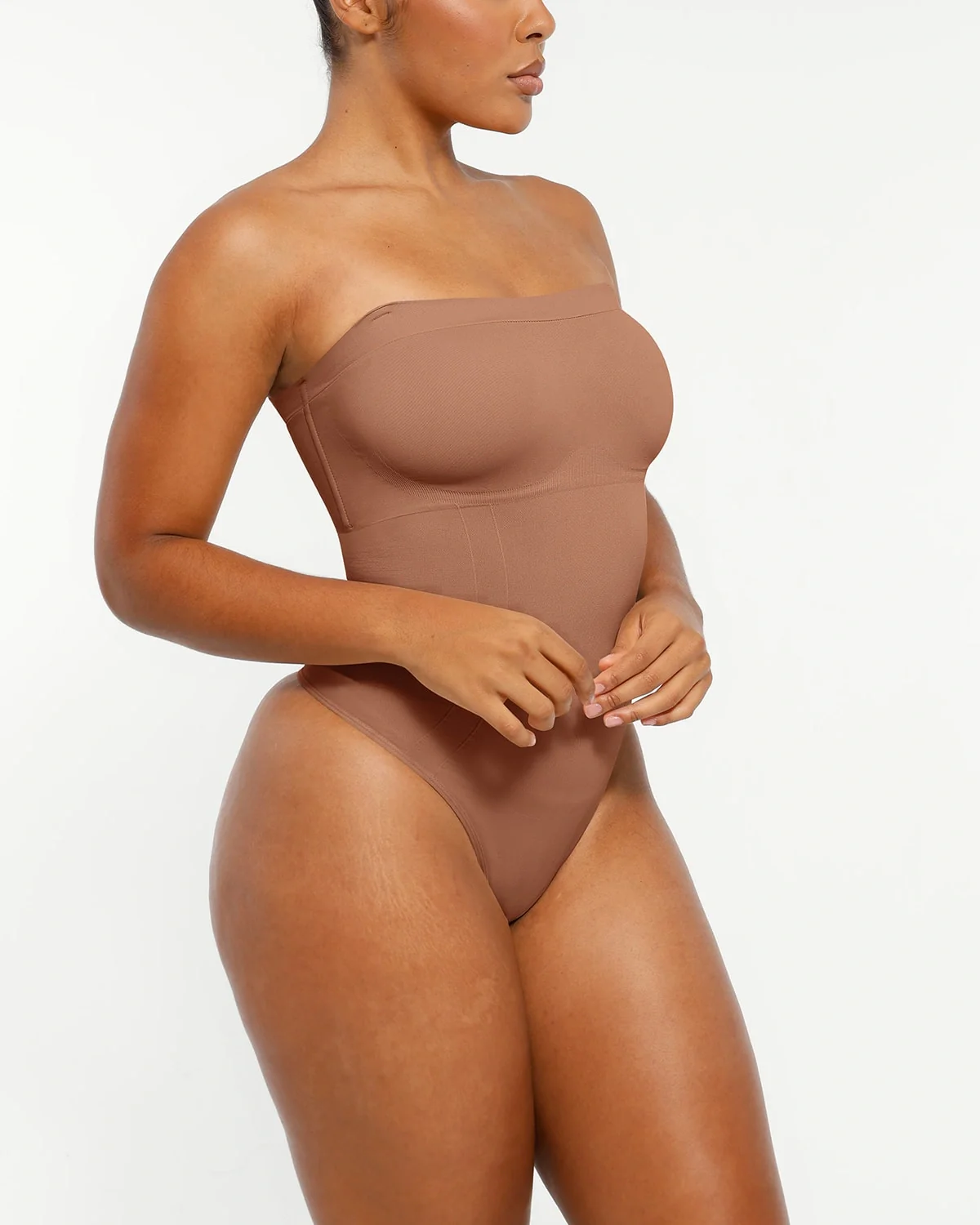 Bare Essentials™ Skin Flow Strapless Sculpt Thong Bodysuit - Image 17